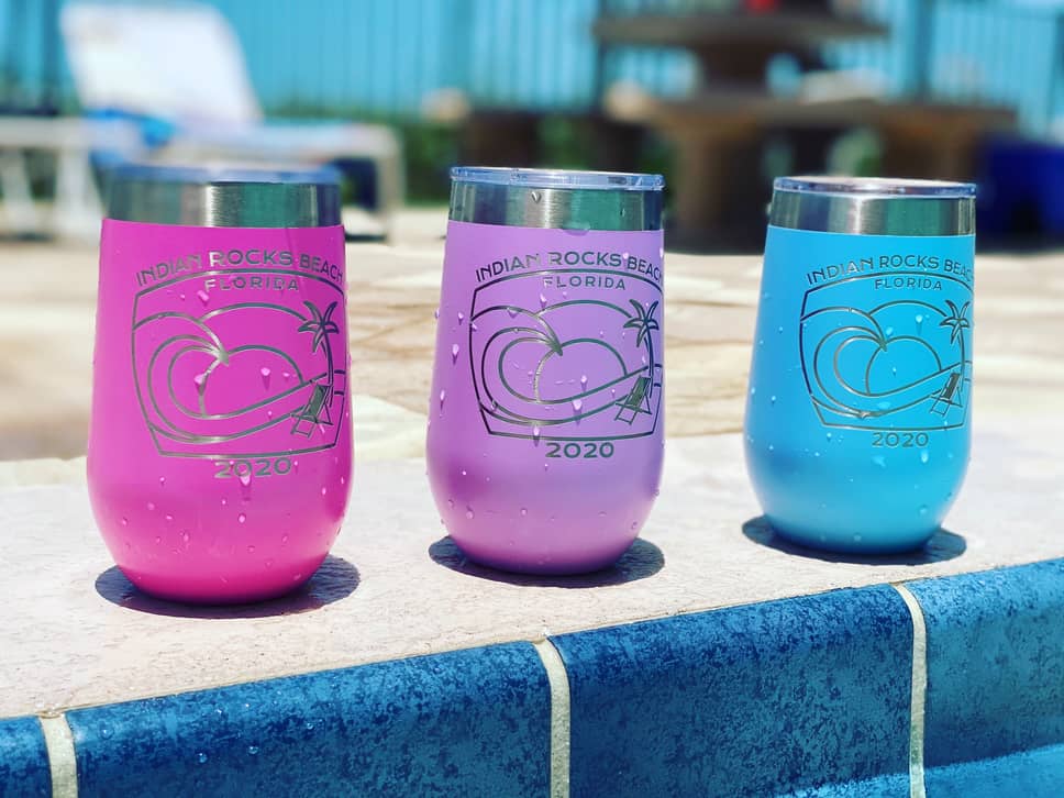 three laser engraved wine tumblers in various colors